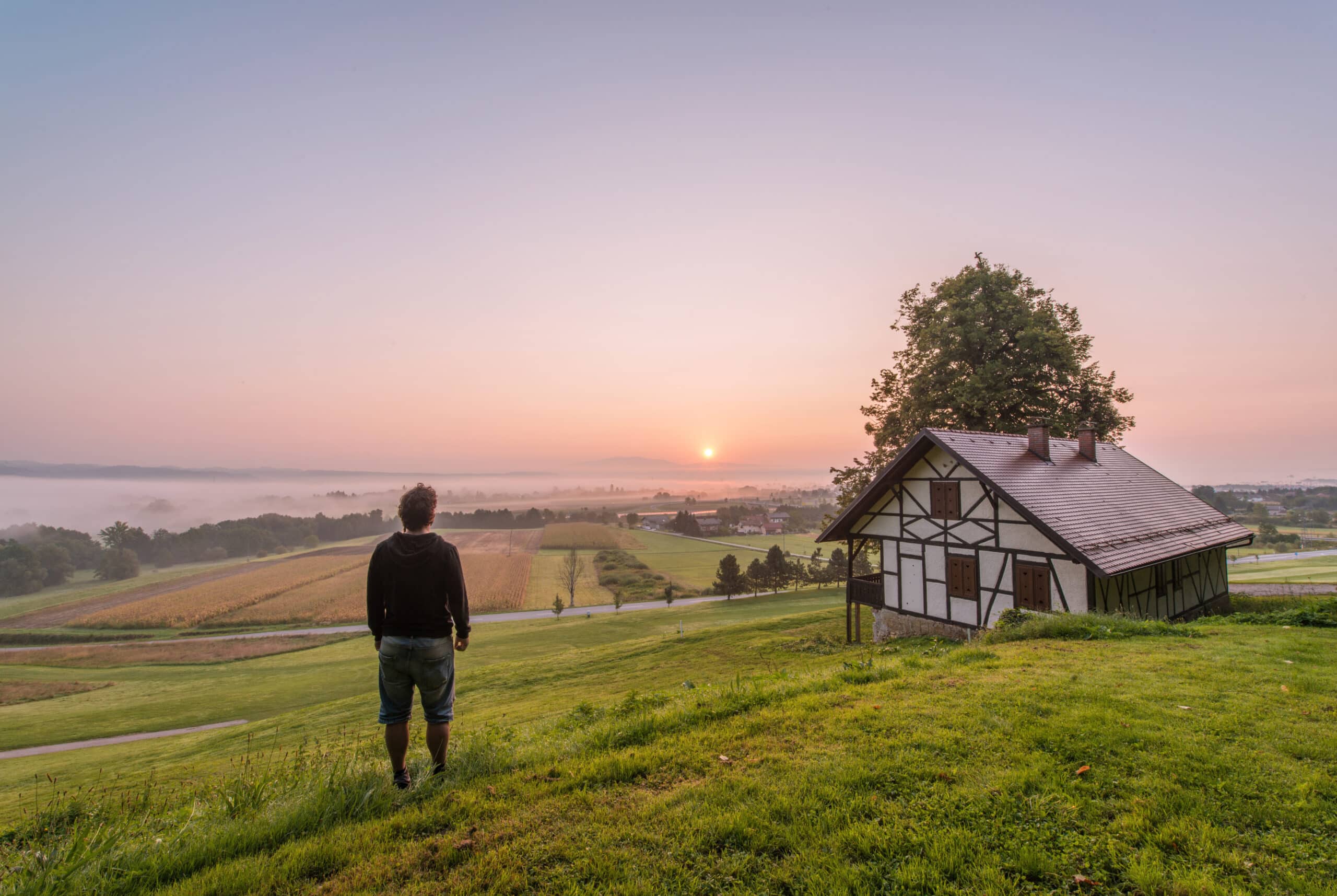 man standing near house and tree at daytime photo – Free Human Image on Unsplash man standing near house and tree at daytime photo – Free Human Image on Unsplash